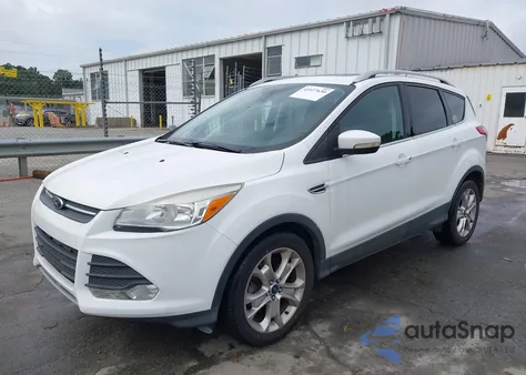 2014 Ford Escape Titanium z USA, uszkodzony, nr VIN 1FMCU9JX7EUB36879